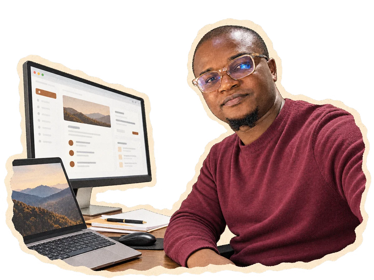 Ademola at his desk
